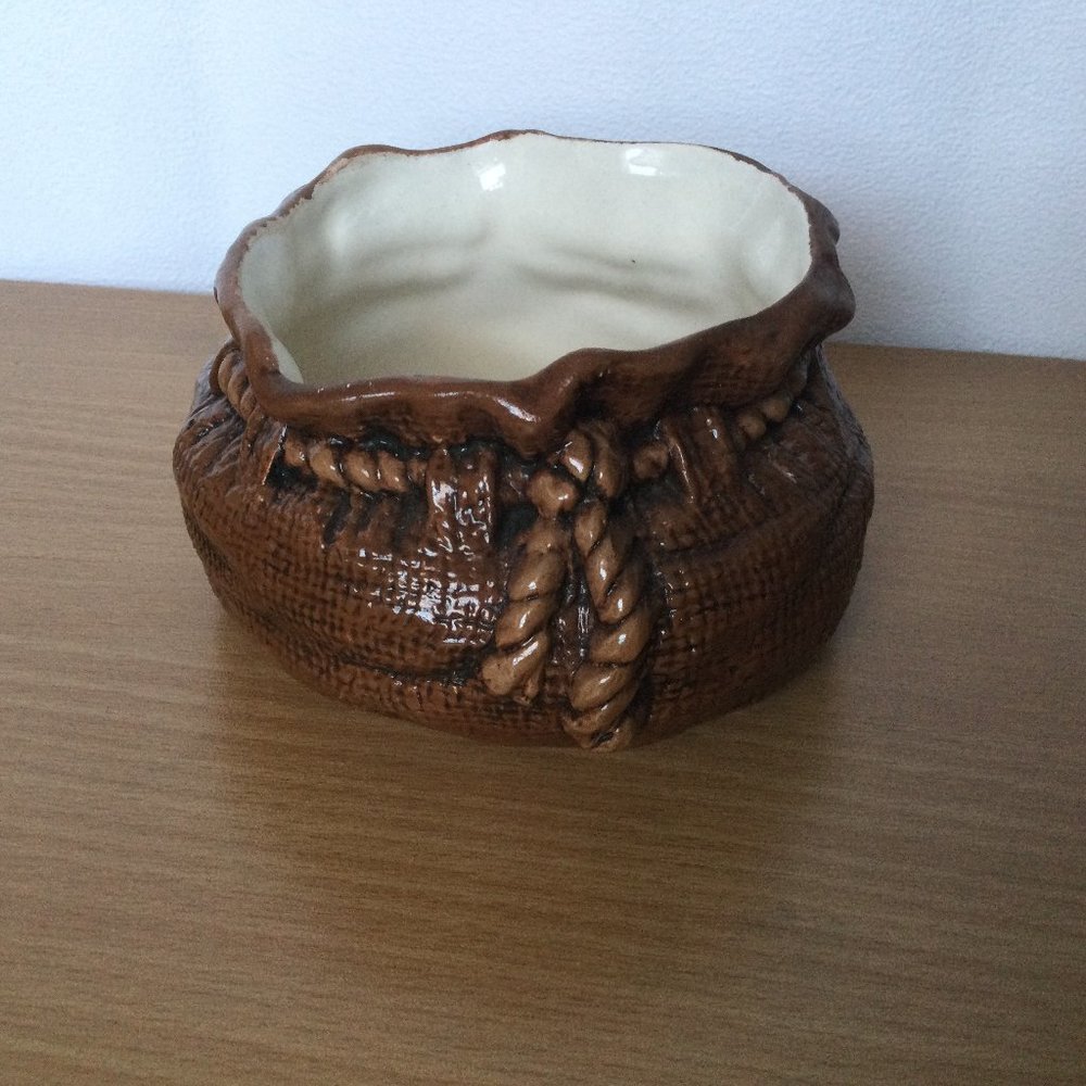 Brown handmade sack bag ceramic pottery jar with drawstring signed